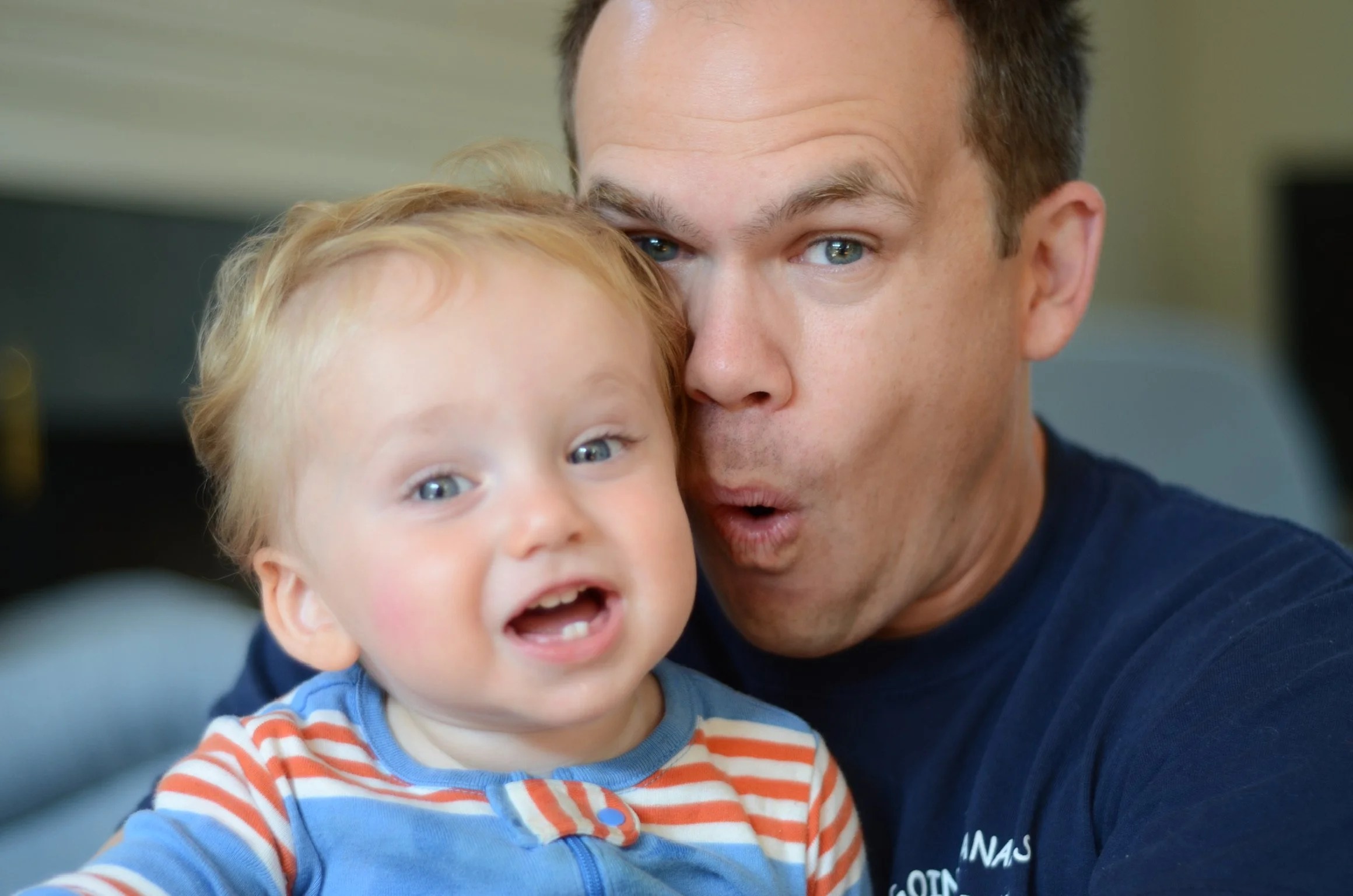 Rob Wittmann taking a selfie together, both making surprised or playful facial expressions, in a close-up shot indoors.