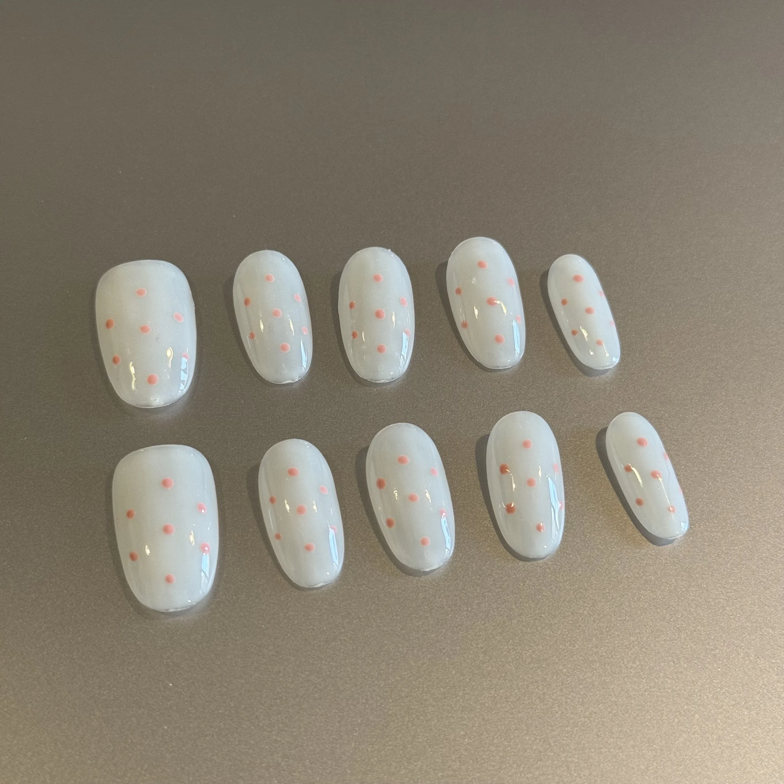 Long-Lasting Glossy Nail Polish with Delicate Dots