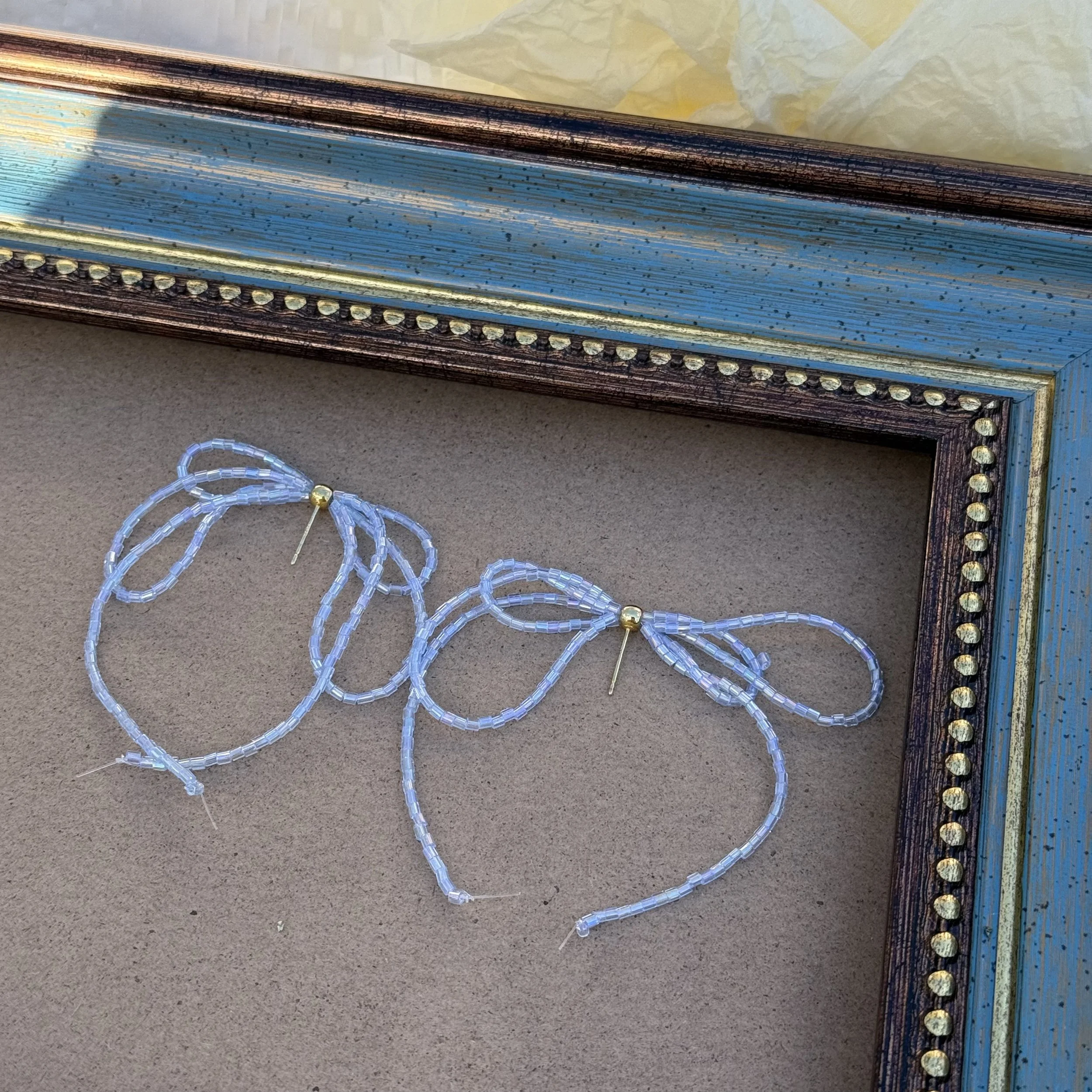 Enchanting Beaded Bow Earrings