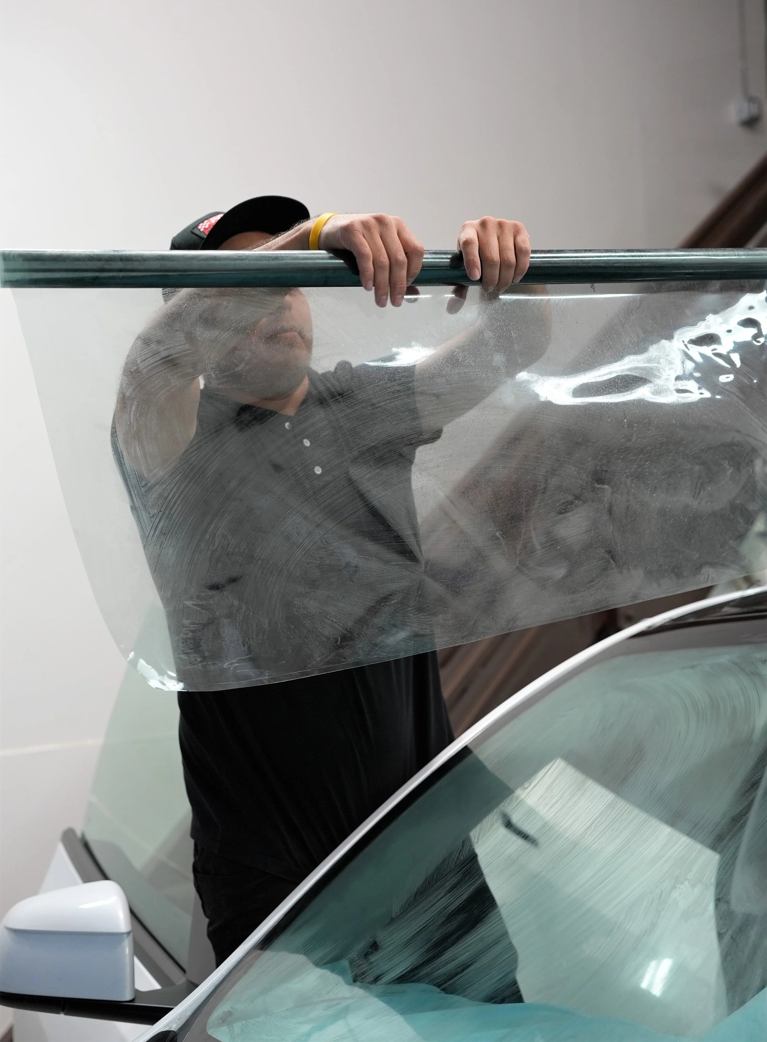 Professional automotive workshop environment in Campbell, representing premium ceramic window tint, paint protection film, and ceramic coating services by Enthusiast Auto Tint for luxury and performance vehicles.