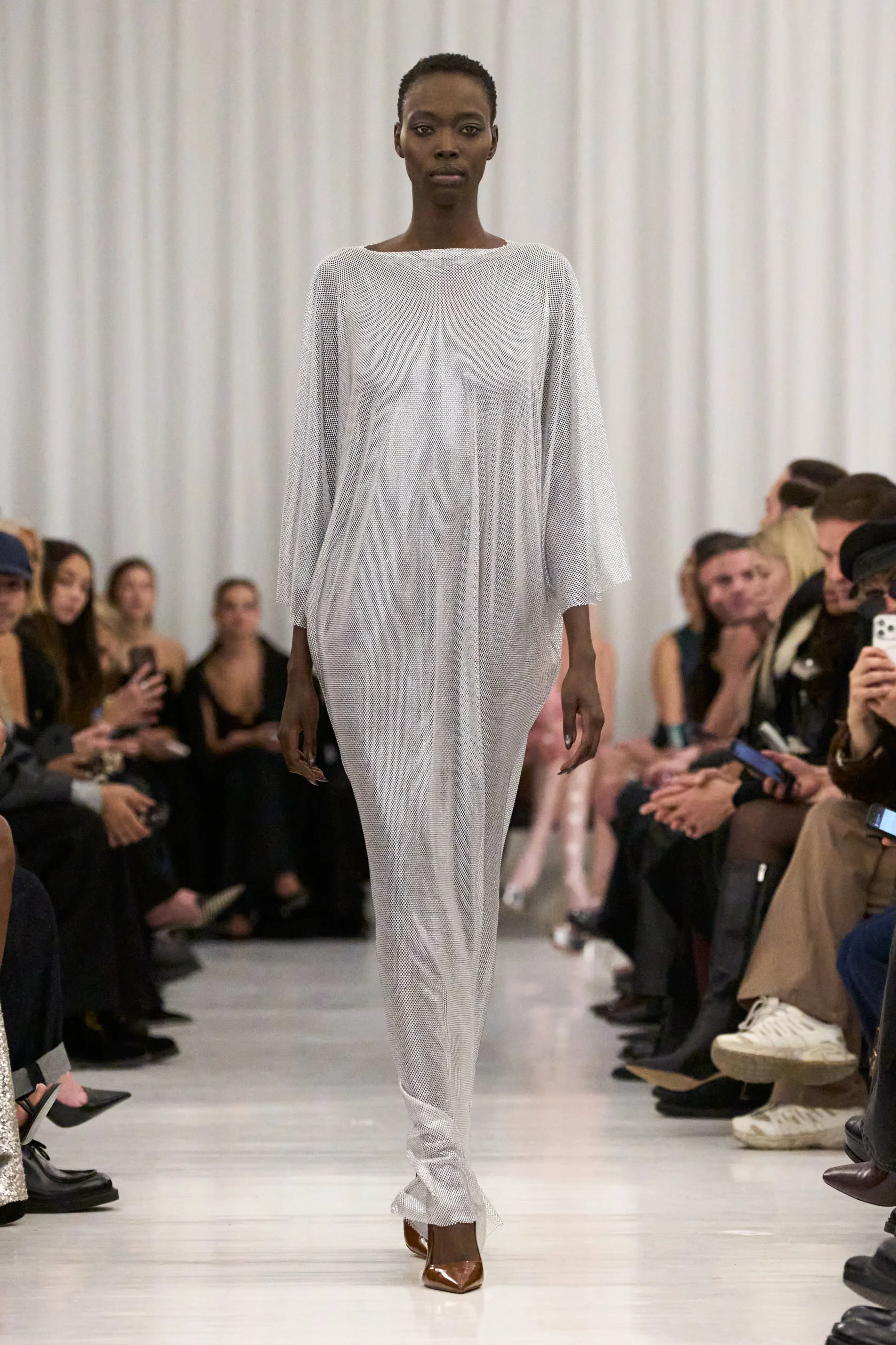 Elisse helped to hand sew french seams along the side seams of this garment 