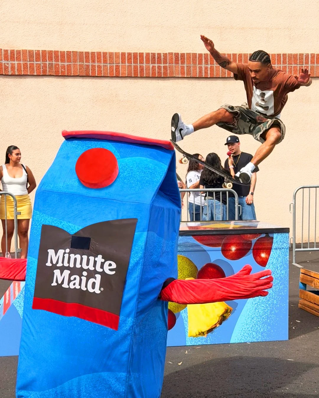 Minute Maid Juicehead mascot with skater