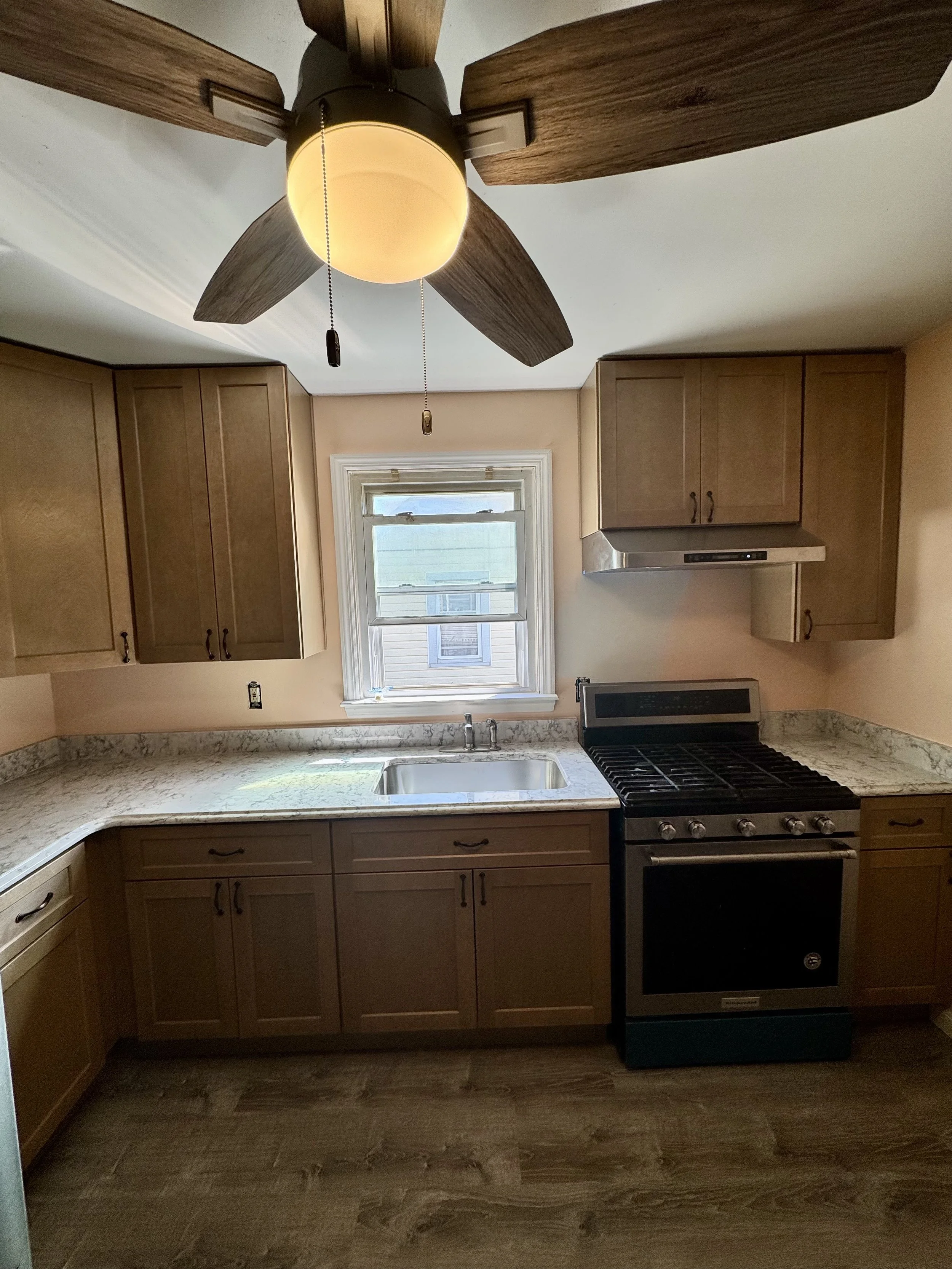 Warm wood tone kitchen cabinets