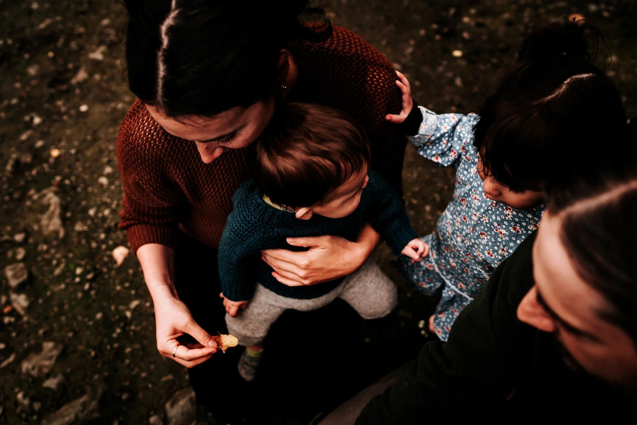 If you book a session with me, you&rsquo;re going to get a lot of photos like this in your gallery. I call these the &ldquo;in between&rdquo; and they&rsquo;re my absolute FAVORITE. I love photographing the way those little hands hold onto you and ho