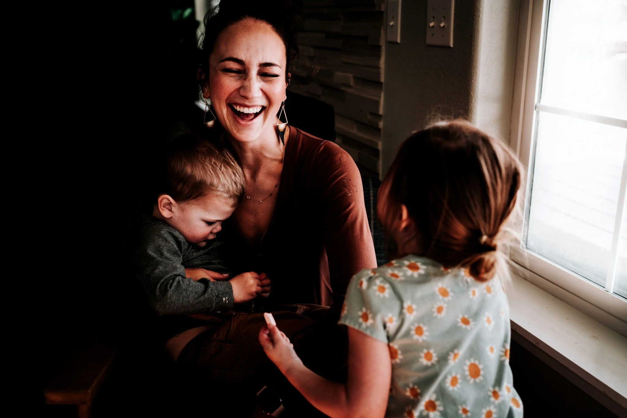 Why &ldquo;lifestyle&rdquo; photography? Because of this. Stiff uncomfortable smiles are not what your kids want to see when they&rsquo;re grown. They want to see you LAUGH. They want to see the joy you had on your face when they made you smile when 