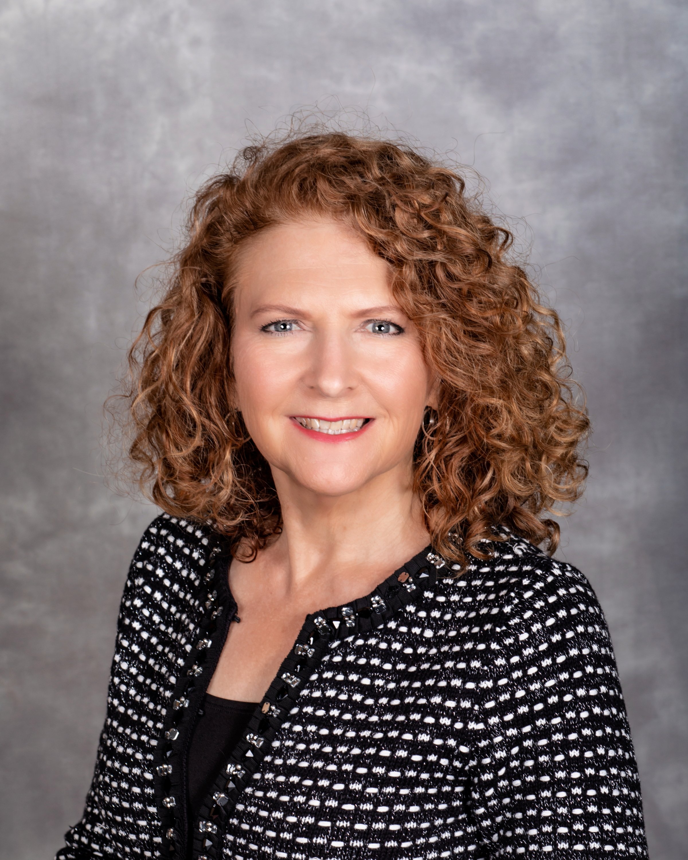 Professional portrait of Kerry Bartlett.