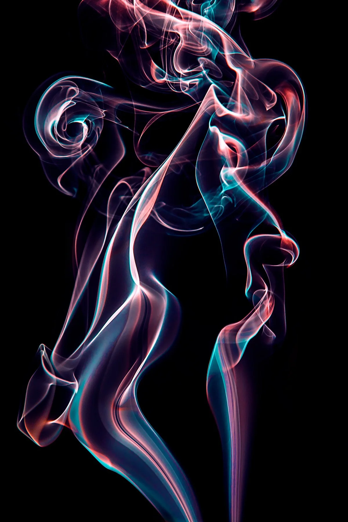 Colorful swirling smoke tendrils against a black background.