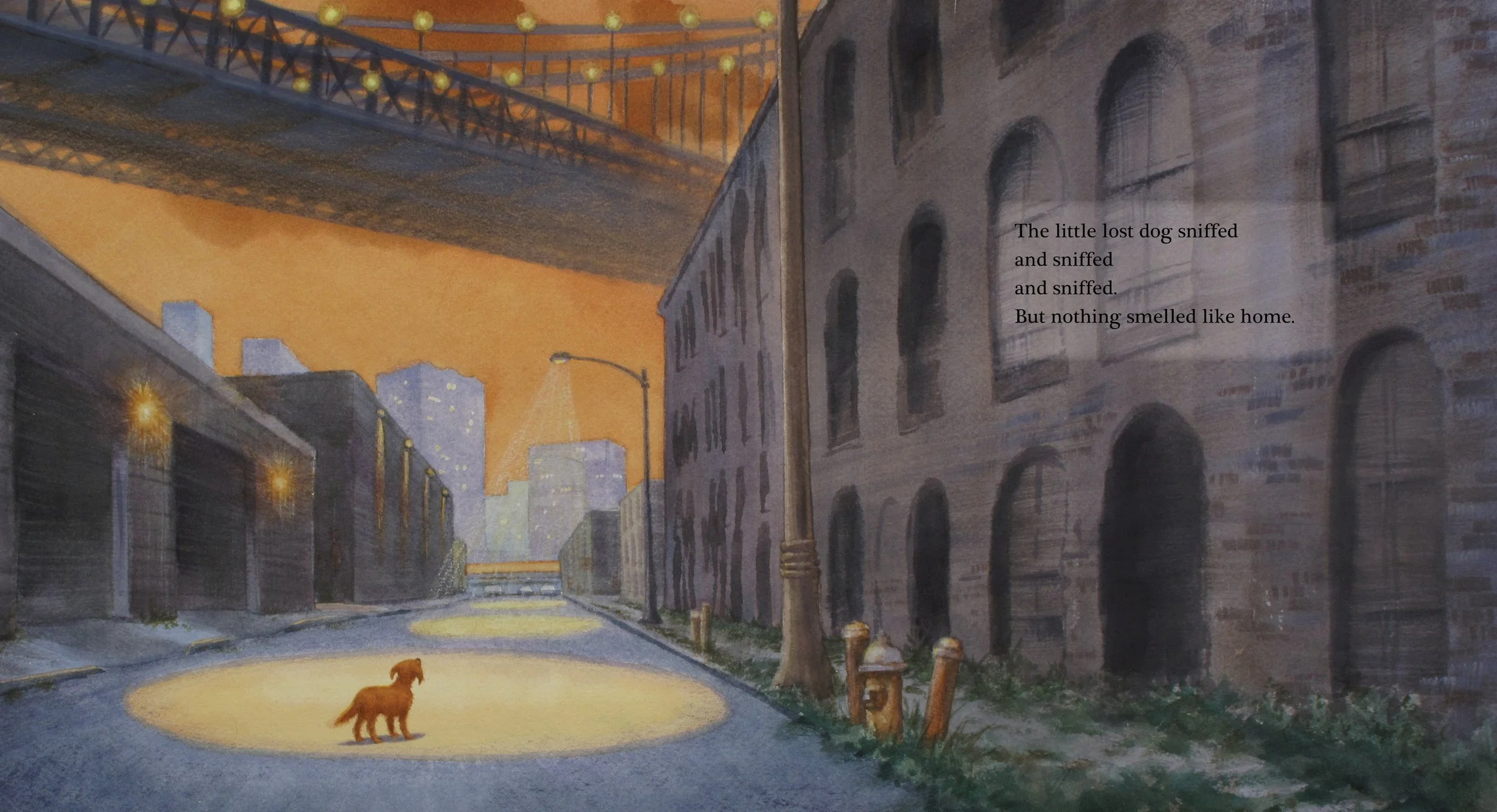 An illustration of a quiet city alleyway at dusk with a little lost dog sniffing the ground in a yellow spotlight, surrounded by old brick buildings, streetlights, and a bridge overhead. A poem about a lost dog is included on the right side.