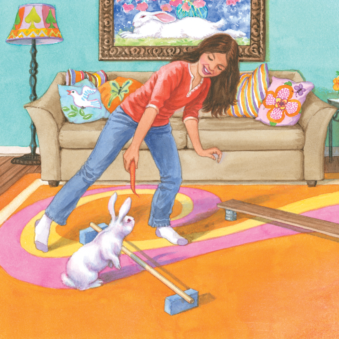 A woman playing with a white rabbit in a colorful living room. The woman is holding a carrot and smiling, while the rabbit stands on its hind legs near a wooden ramp. The room has a beige couch with decorative pillows, a colorful lamp, and a painting of a rabbit on the wall.