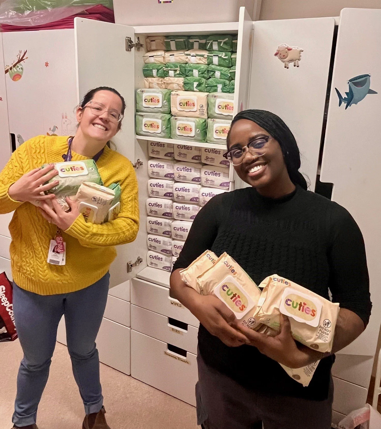 St Michael's staff are shown receiving their first Baby Love wipes delivery