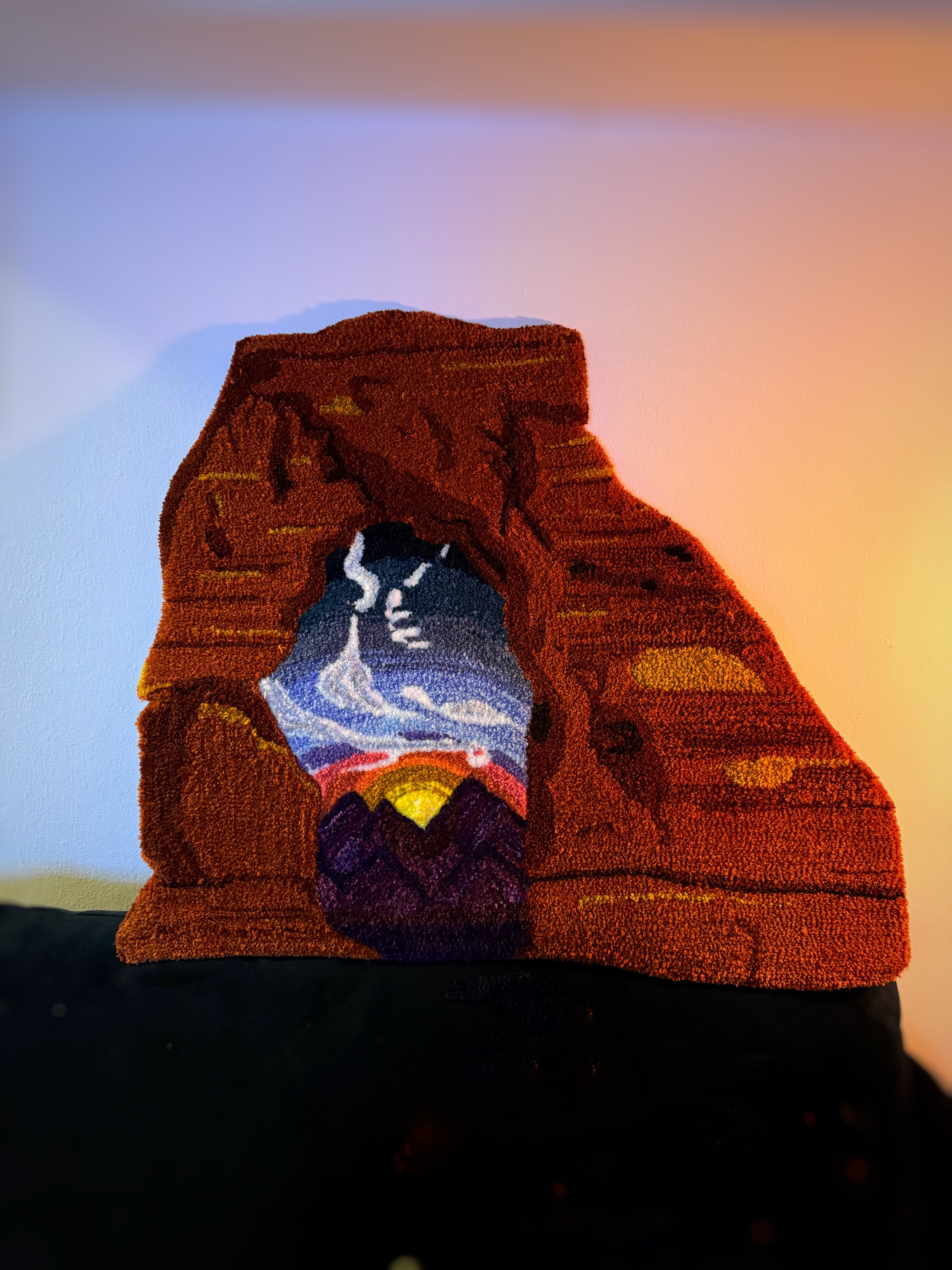 Custom rug designed for a friend who proposed at Arches National Park at sunset. I tried to capture the unique cloud formation present that night beneath the Delicate Arch.