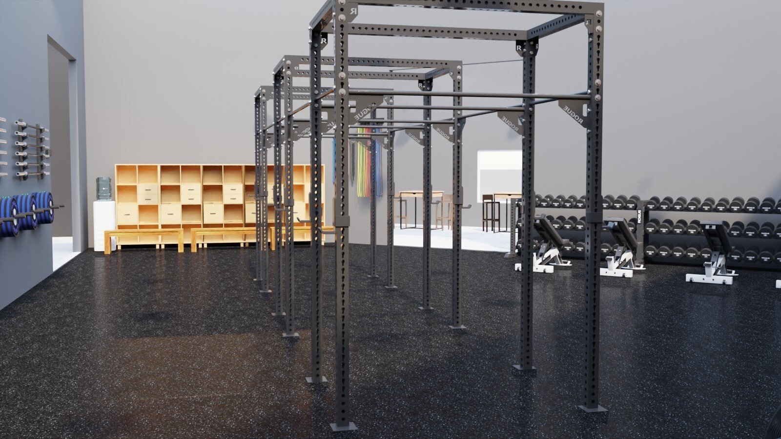 Empty gym with black metal pull-up bars, dumbbell racks, and wall-mounted weight plates.