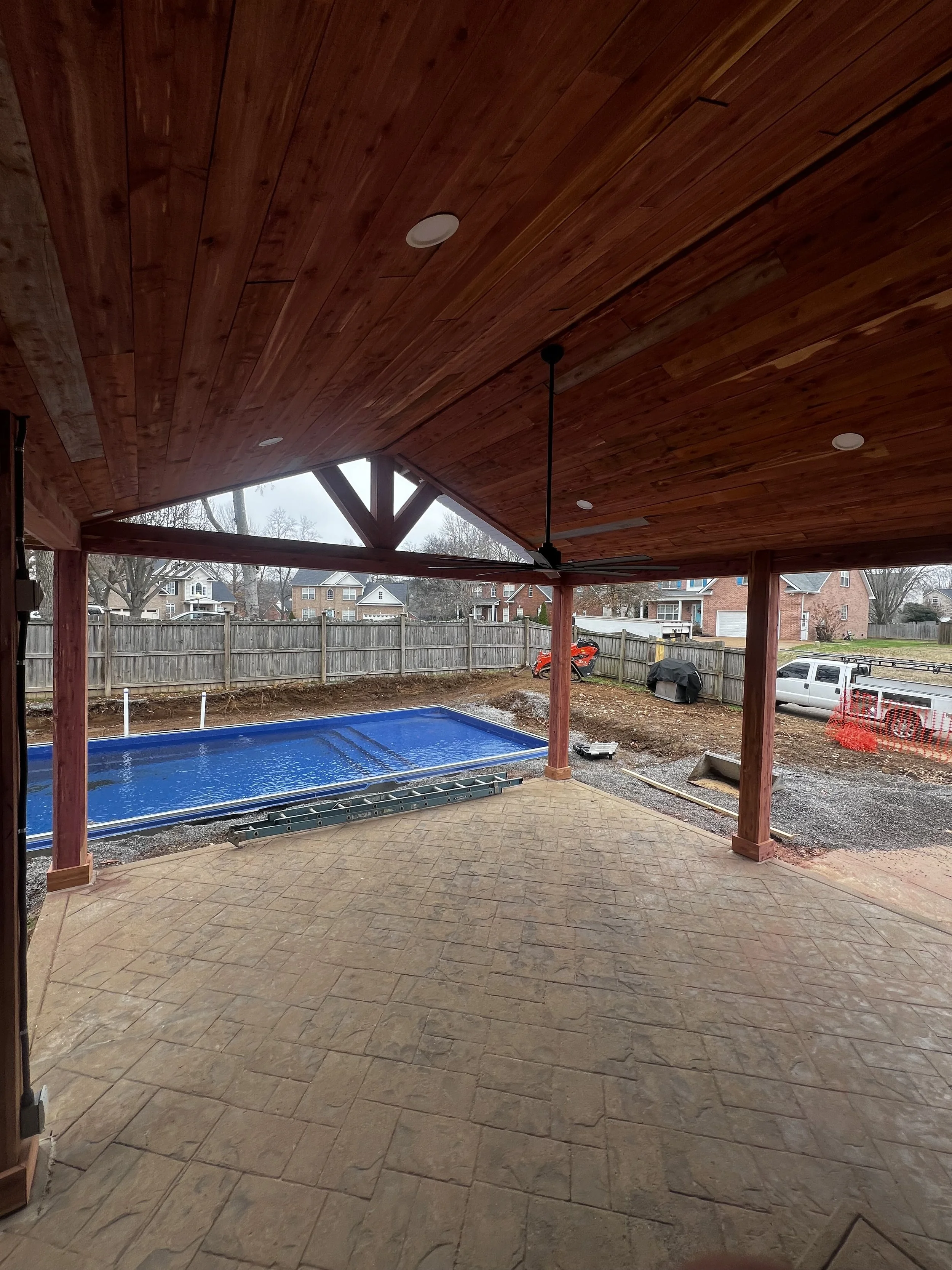 The inside of this gorgeous all Western Red Cedar porch with a fan and lights