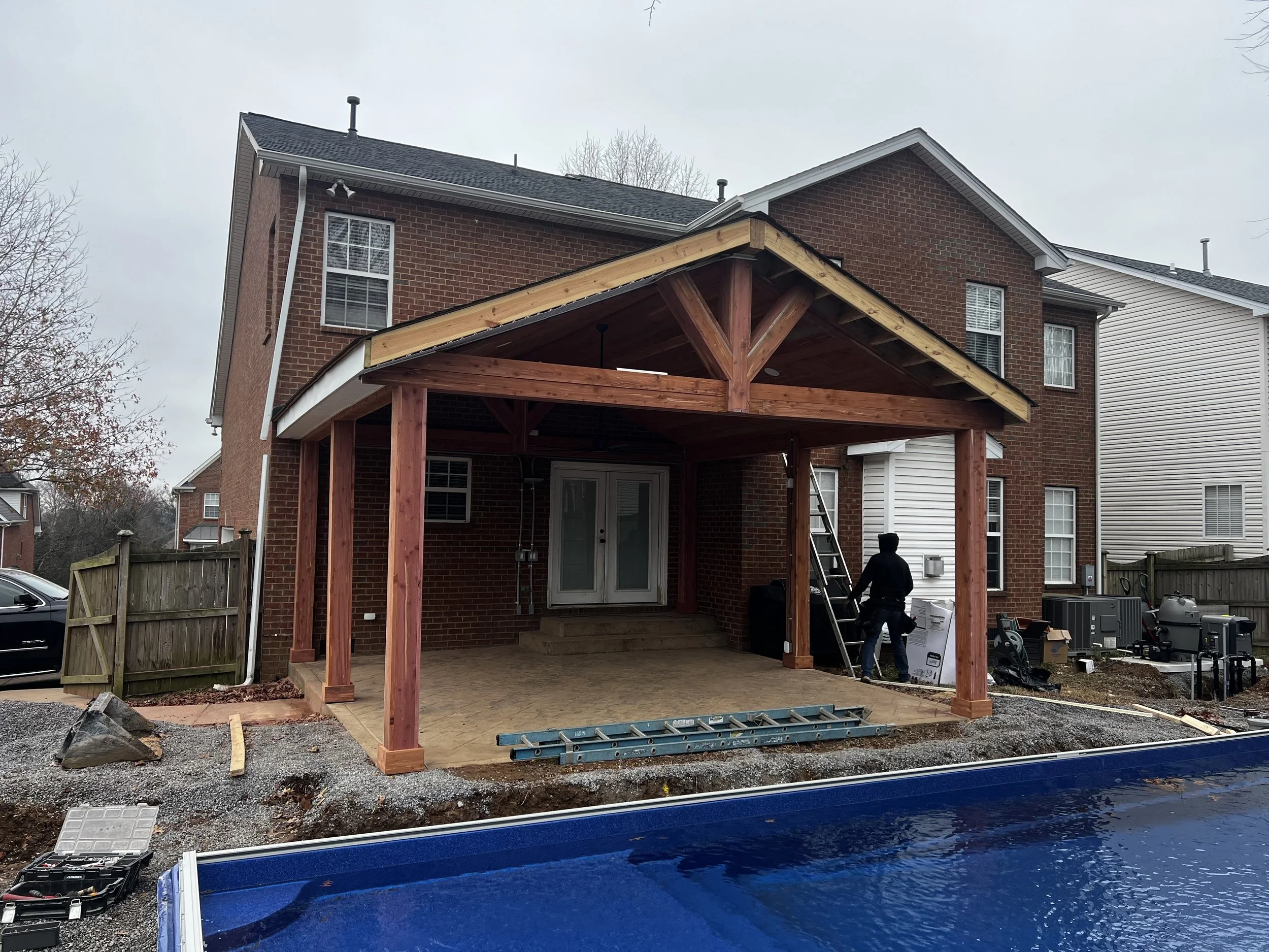 We helped our clients here transform their backyard with this beautiful all cedar porch with another great contractor who did the pool!
