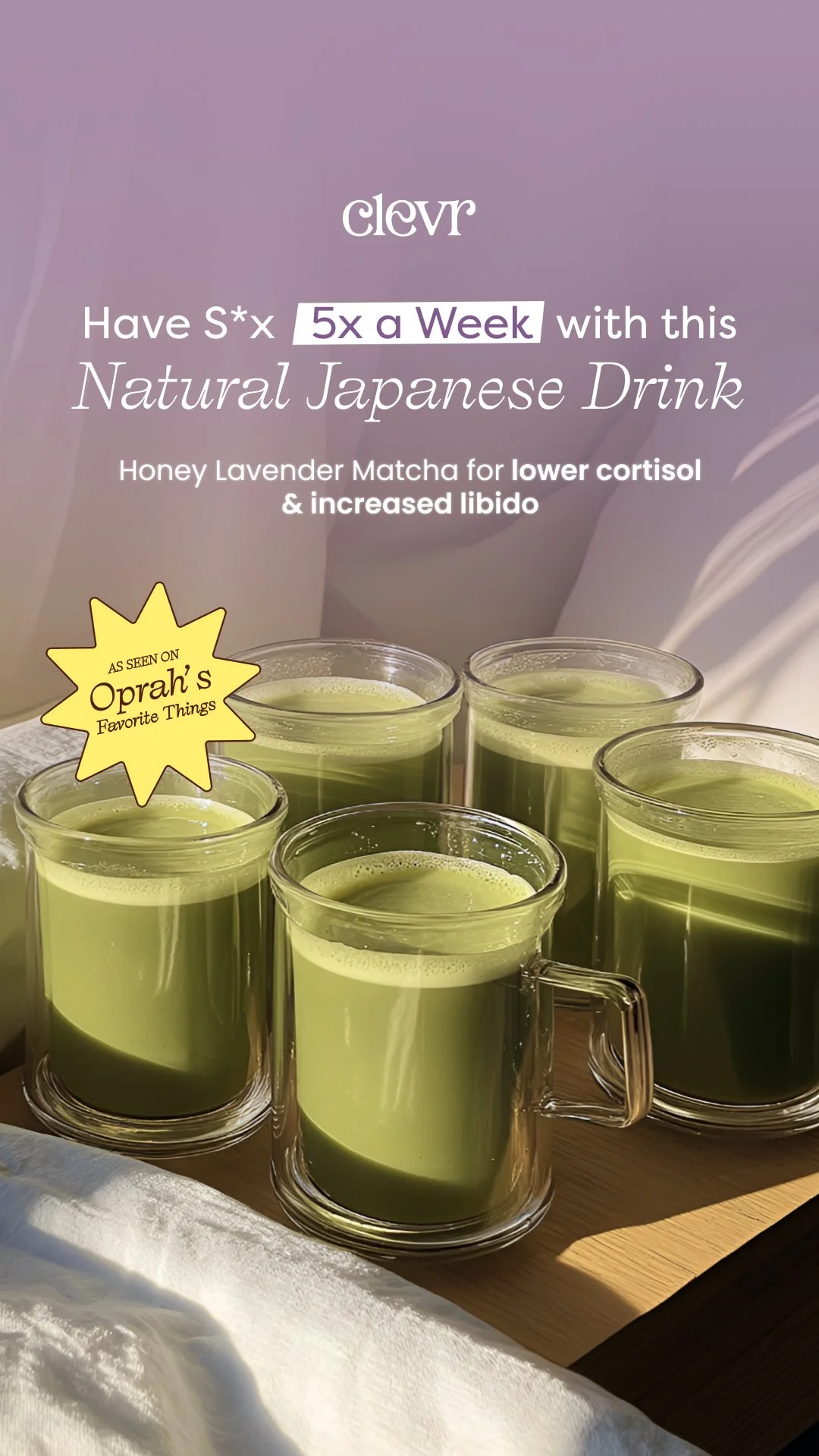 Six glass mugs filled with green honey lavender matcha drink on a wooden surface, with a purple background featuring white and purple text and a yellow starburst sticker.