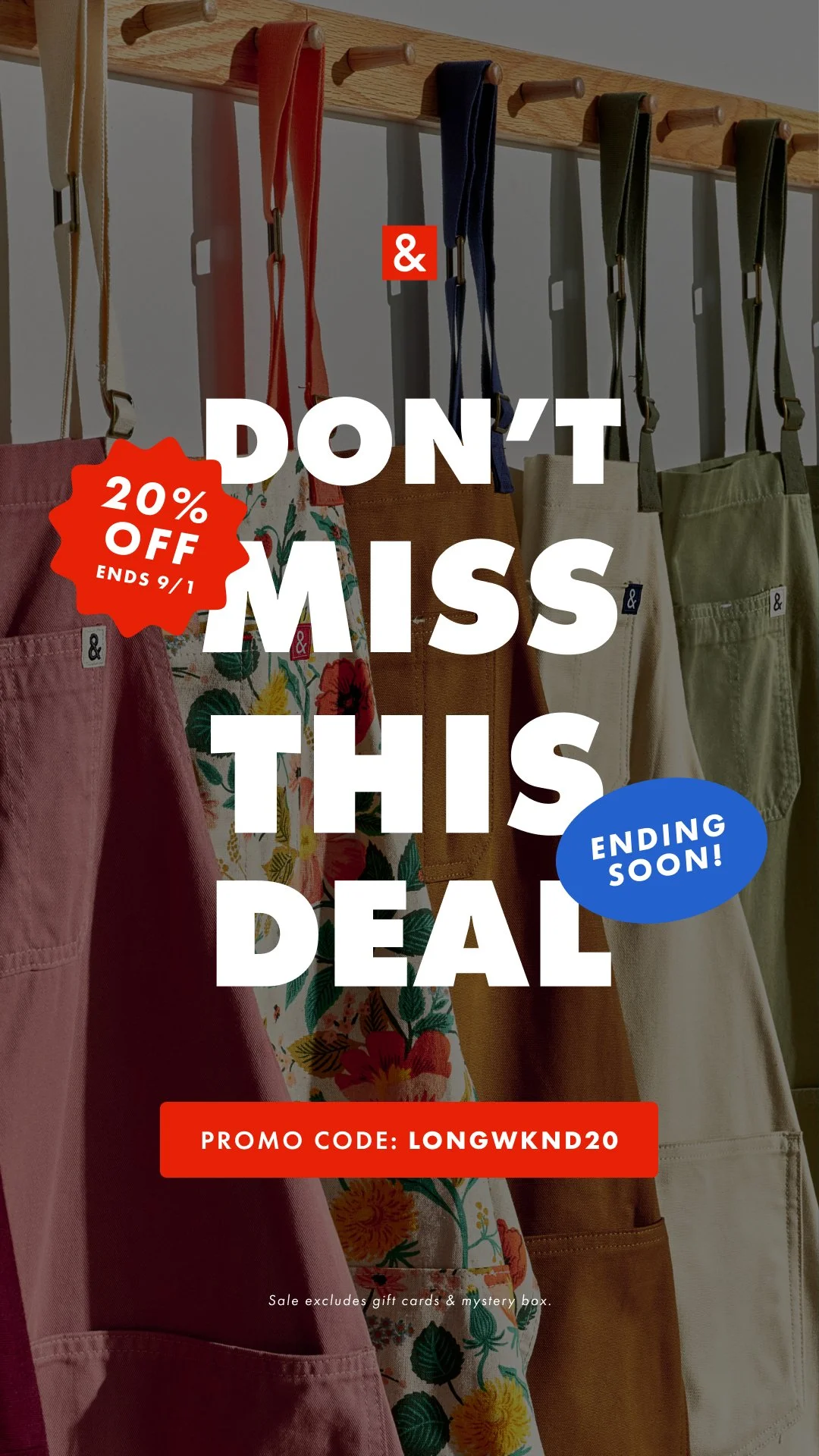 Clothing items hanging on a wooden rack, including colorful and neutral-colored pants and garments, with promotional text overlaid.