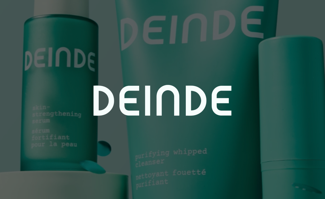 Deinde skincare products, including a purifying whipped cleanser, set on a white surface with a teal background.