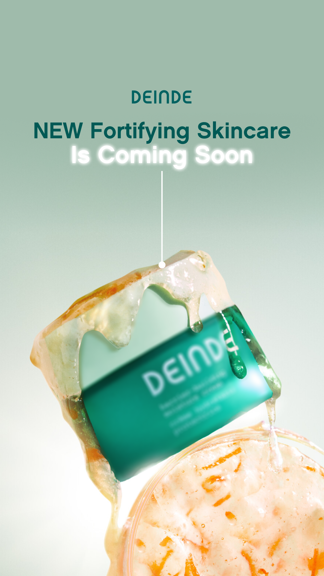 Teaser image for Deinde's new skincare product, featuring a green jar with white creamy substance and liquid dripping from it, with text indicating the product is coming soon.