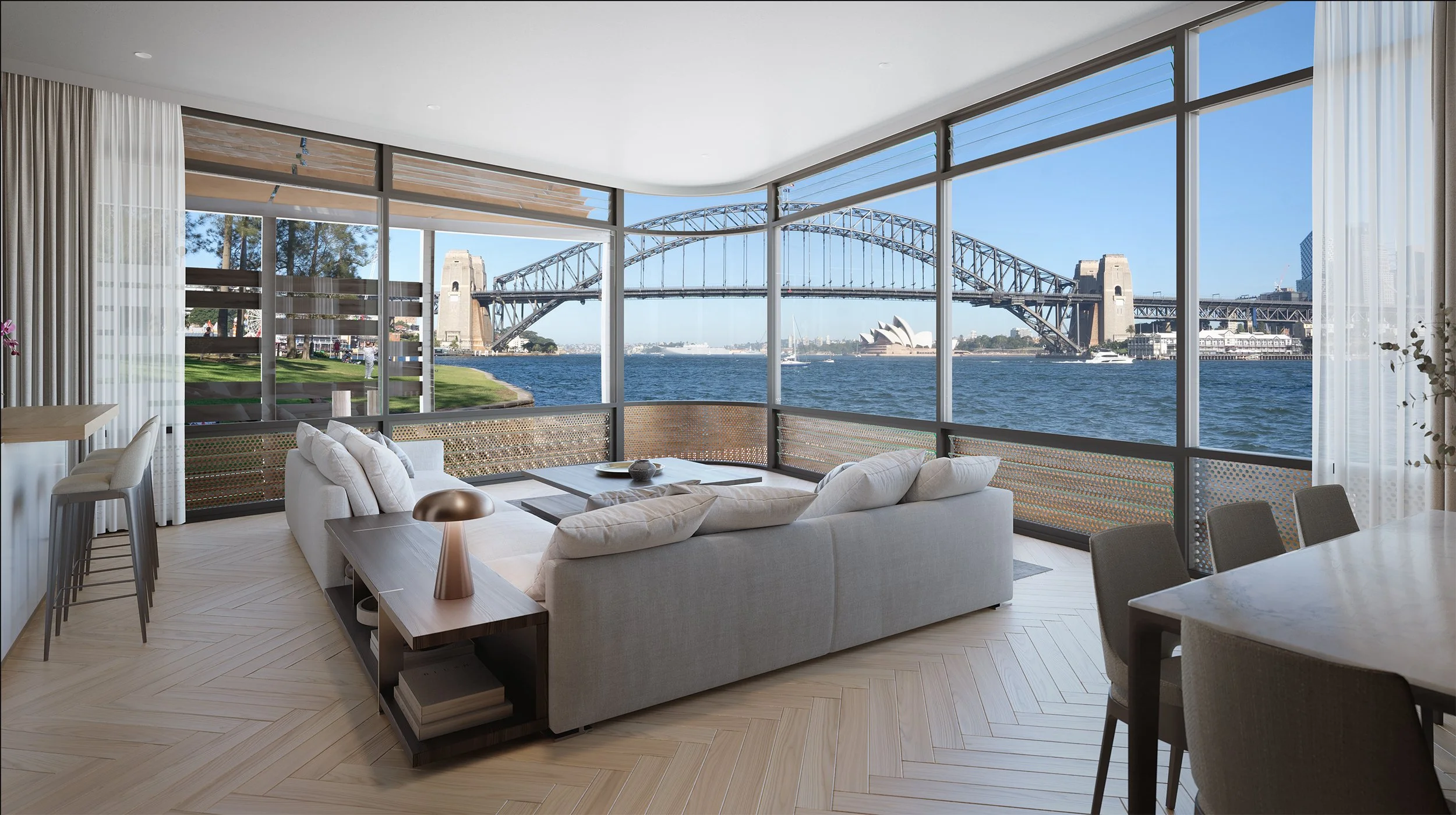 Living room with large windows showing Sydney Harbour Bridge and the Sydney Opera House, with a white sofa, a wooden side table with a copper lamp, and a dining table with chairs.
