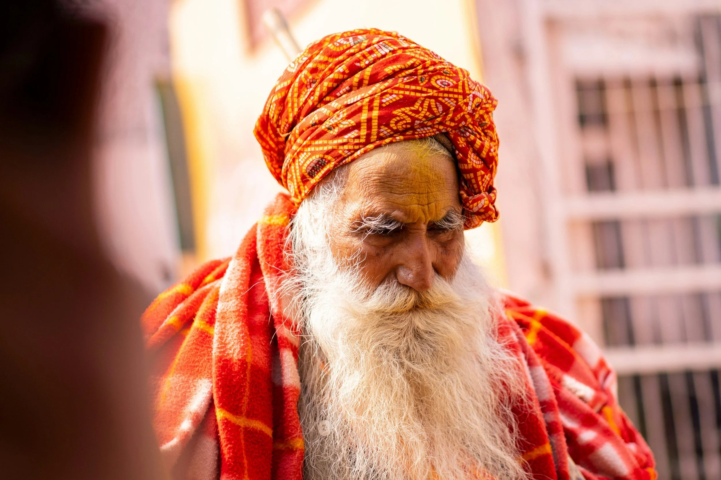 Close-up of an elderly man in India at a Beyond Golf activity on a golf tour to Northern India on an India hosted Golf Tour and hosted India sightseeing tour with The 19th Golf Escapes.