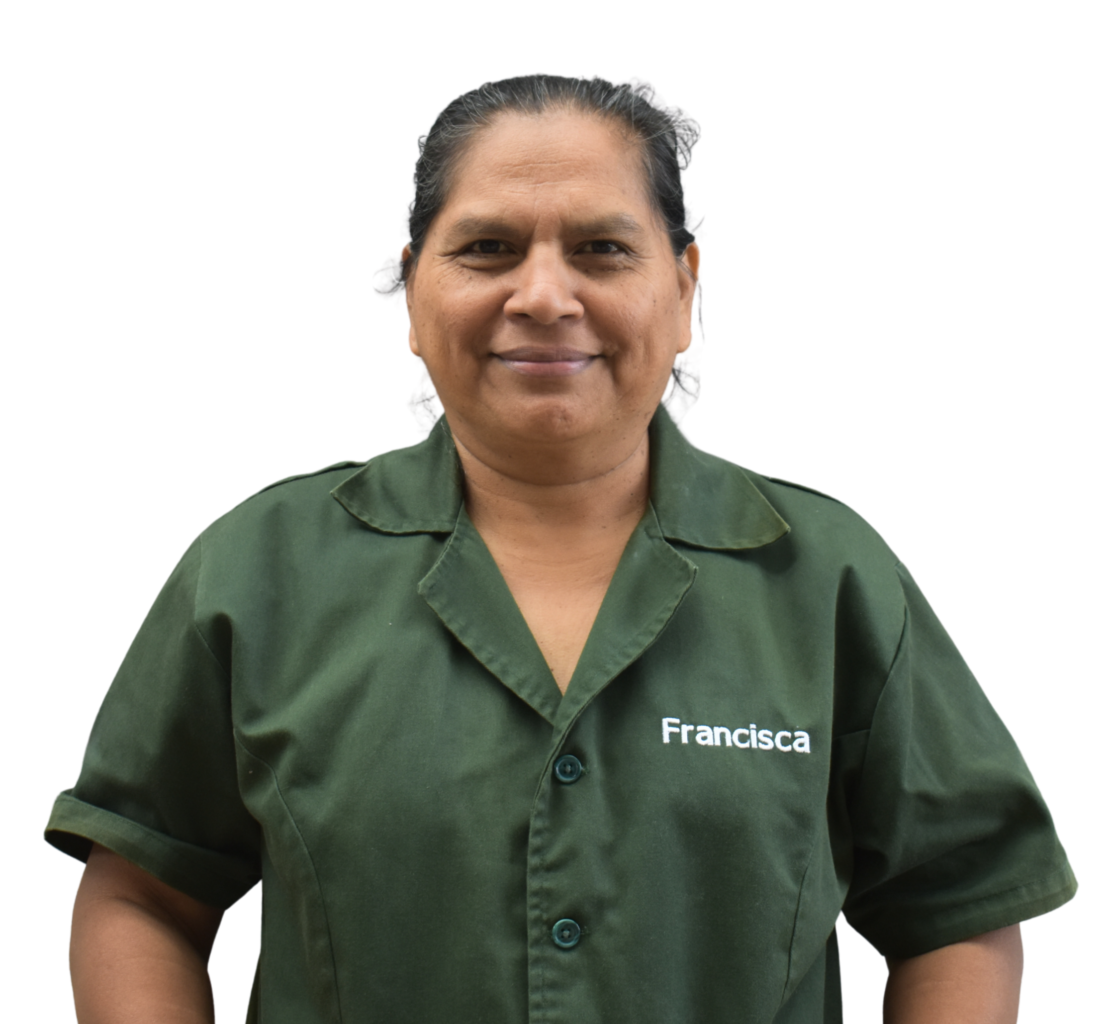 A woman with dark hair pulled back, wearing a green uniform shirt with the name 'Francisca' embroidered on it, smiling at the camera.