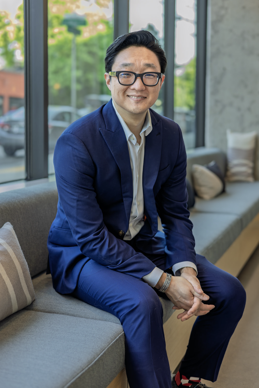 Logo for Spruce Veterinary Urgent Care in Hillsboro, Oregon, with a stylized tree in the center.