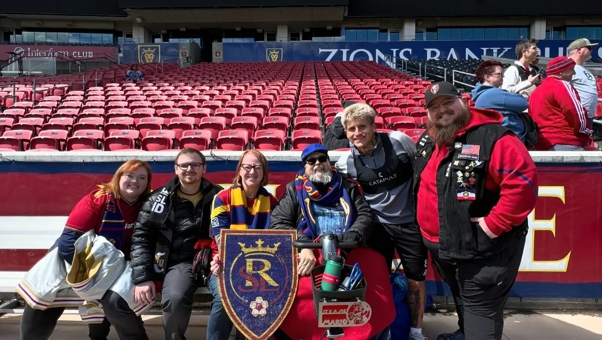 Giles, Kayla, Linda(Giles's mom), Roger(Giles' dad), and Weston(Giles' brother) posing with Diego Luna of Real Salt Lake