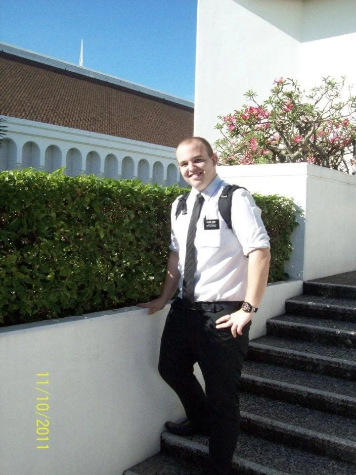 Giles posing for a picture at the Philippines Manila Temple during his mission.