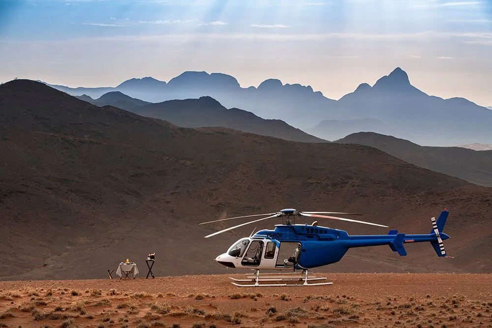 Sossusvlei-Desert-Lodge-Experience-Scenic-Helicopter-Flight-guest-delight-set-up.jpg