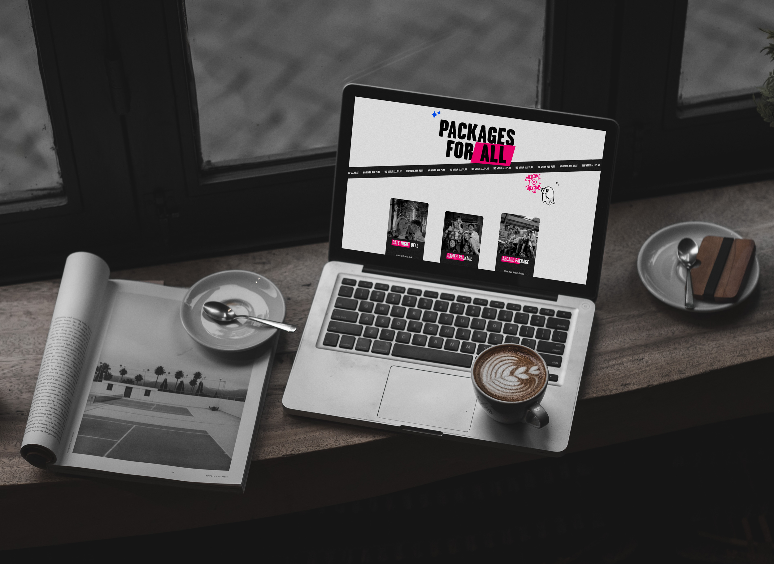 macbook in a cafe with a website advertising packages