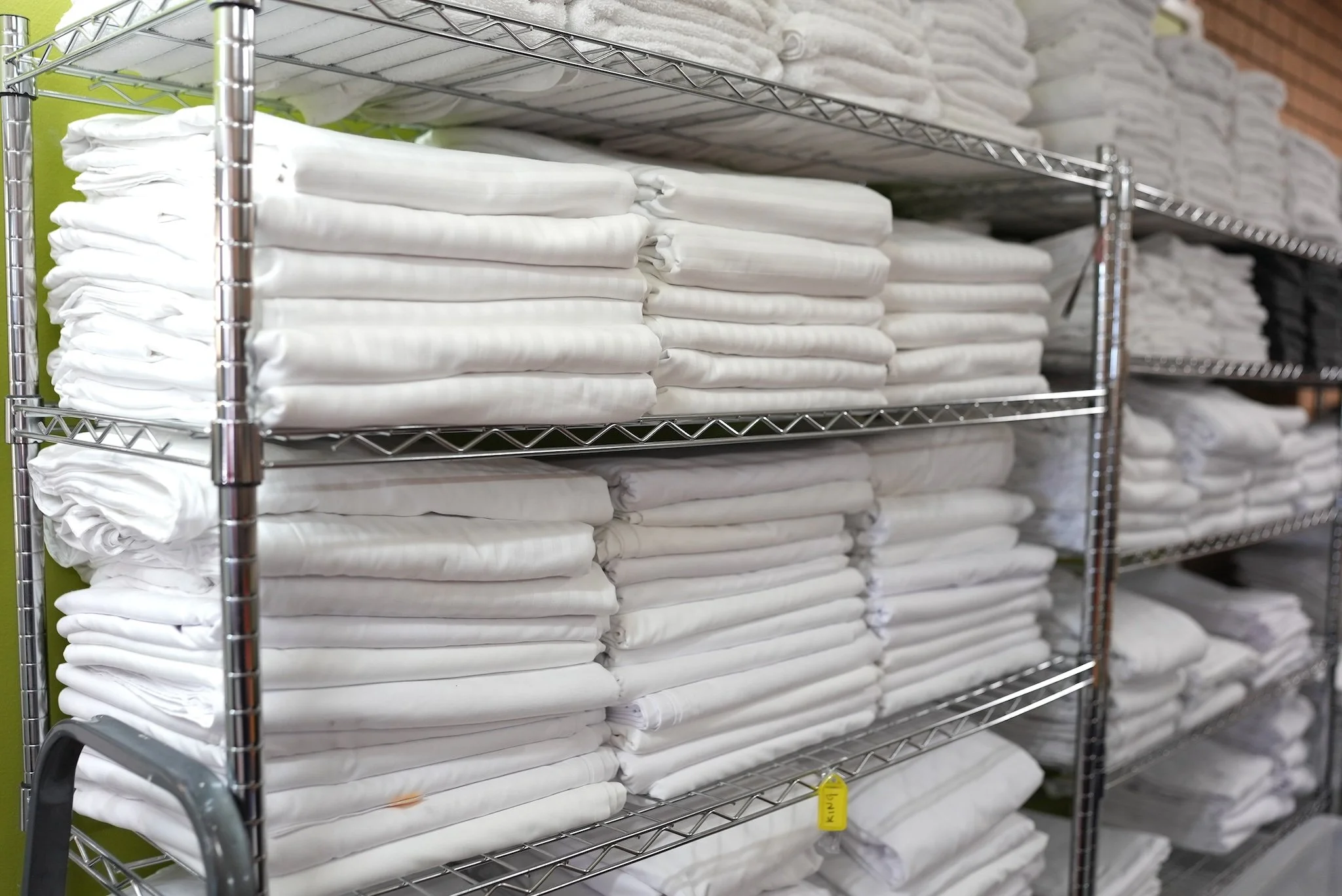 freshly laundered sheets at Akuna Laundry