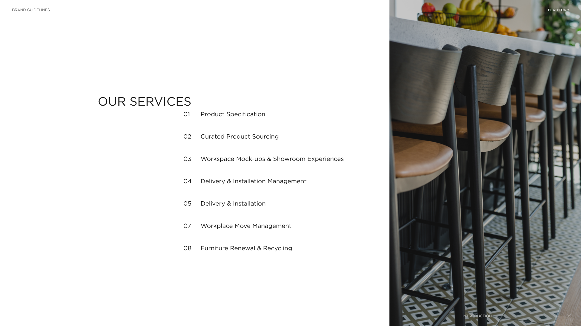 Business presentation slide with a modern bar area featuring high wooden chairs and a fruit bowl on a white countertop.