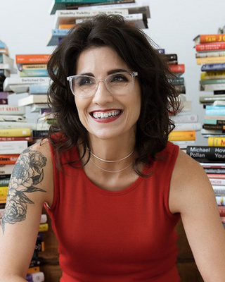 Portrait of  April Kaiserlian, one of A Mindful World's community teachers.