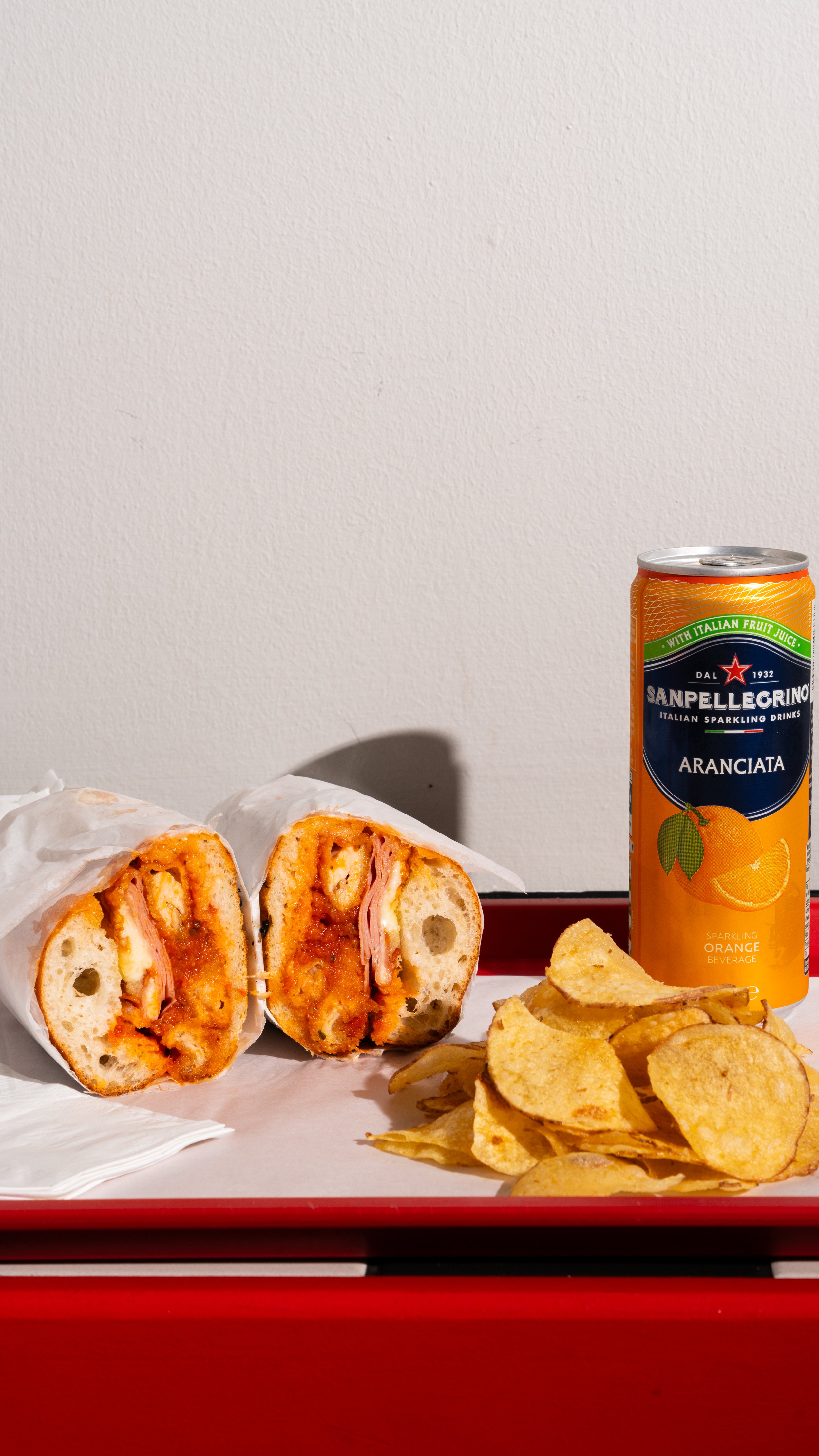 Chicken parm & Orange San Pellagrino