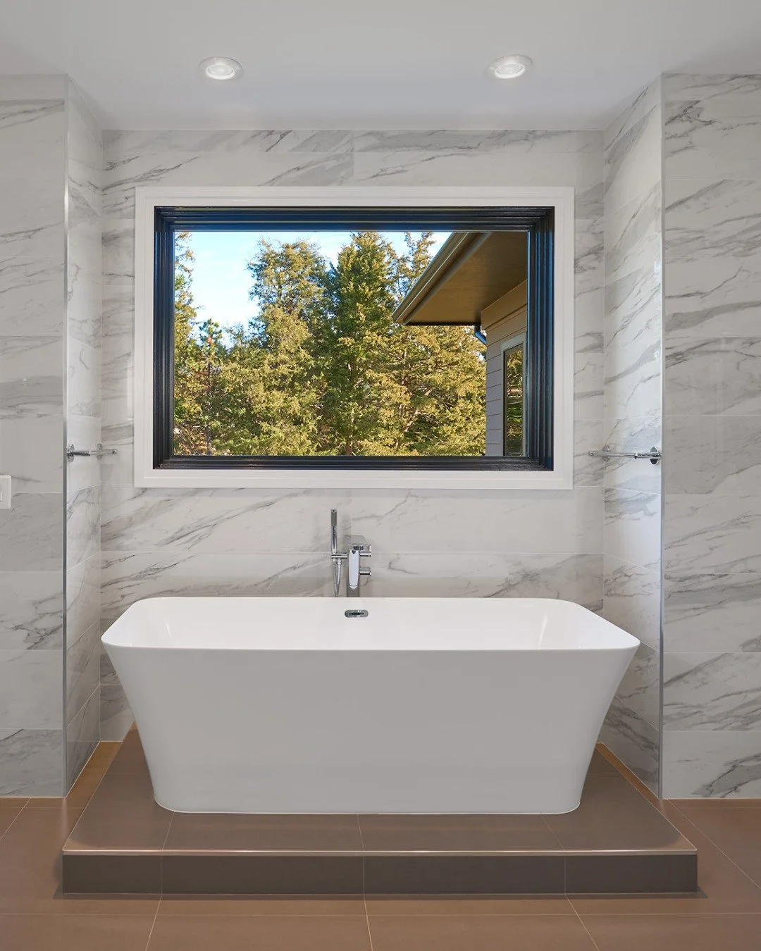 A bathroom designed to slow you down.

Clean lines, soft tones, and intentional materials come together to create a space that feels calm the moment you step inside. Minimal in design, yet rich in texture and detail... nothing excessive, just what&rs