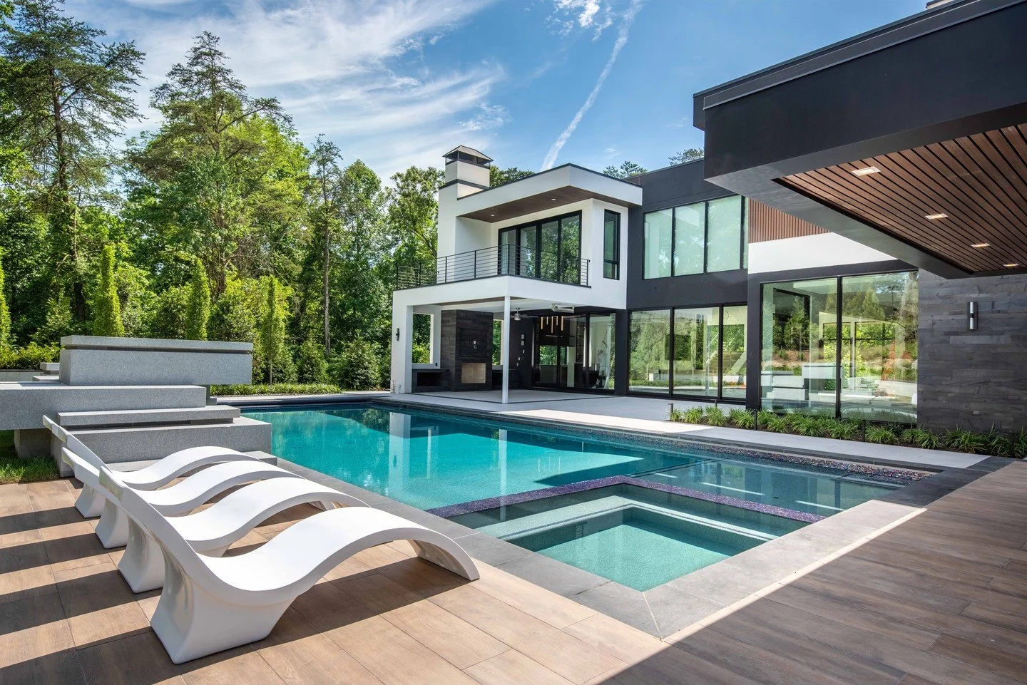 A pool isn't just an addition - it's an extension of the home that deserves thoughtful integration from the very start of your project. Placement, connection to the home, sun exposure, grading, materiality, and even the location of equipment all play