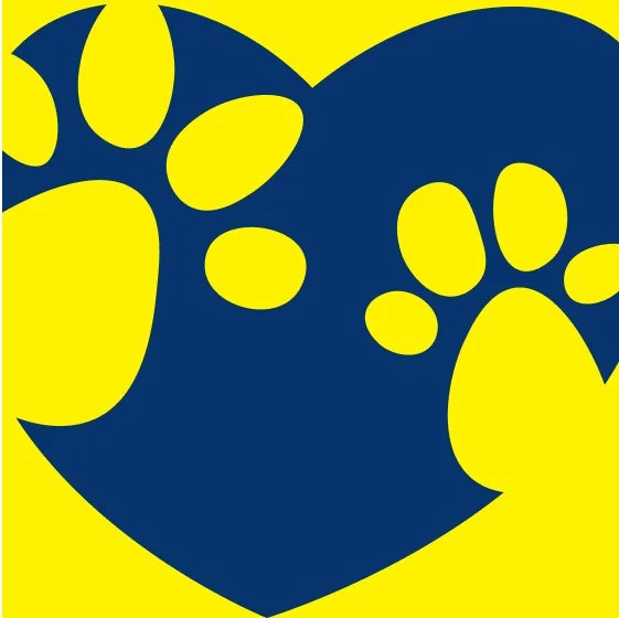 A heart-shaped paw print icon with blue paws on a yellow background.