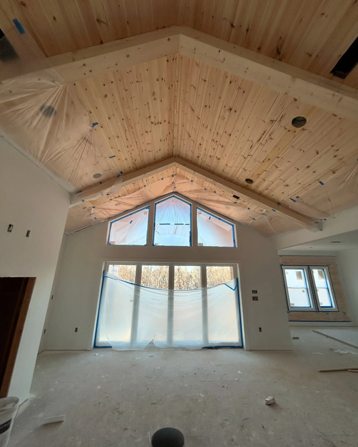To stain or not to stain? Either way, this knotty pine ceiling will always be in style.