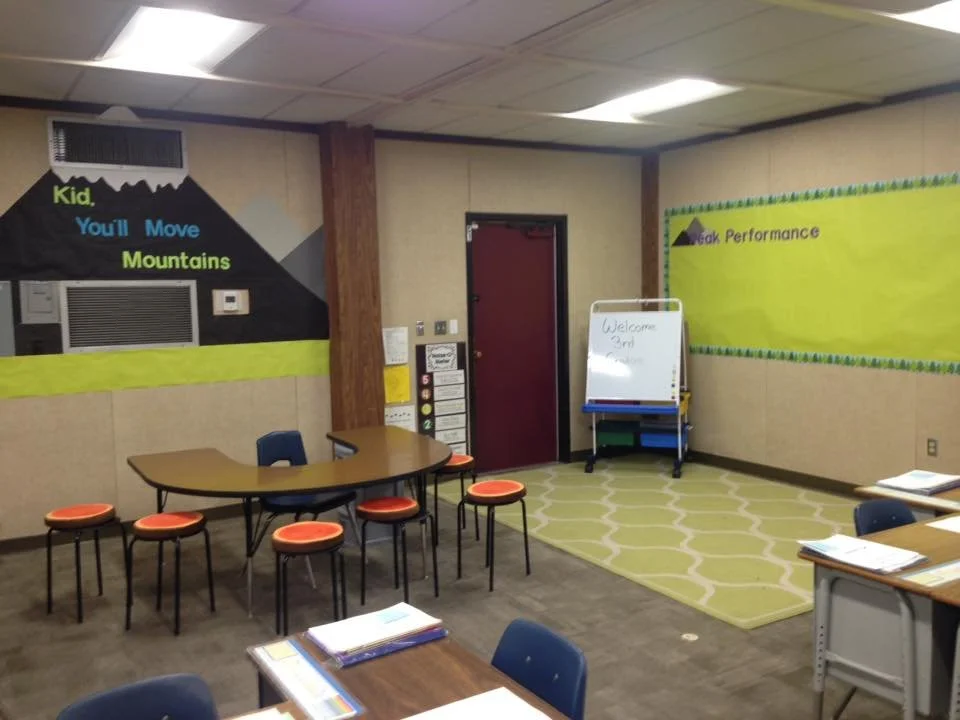 A 3rd grade classroom set up after winter break, with new years activities on the desk