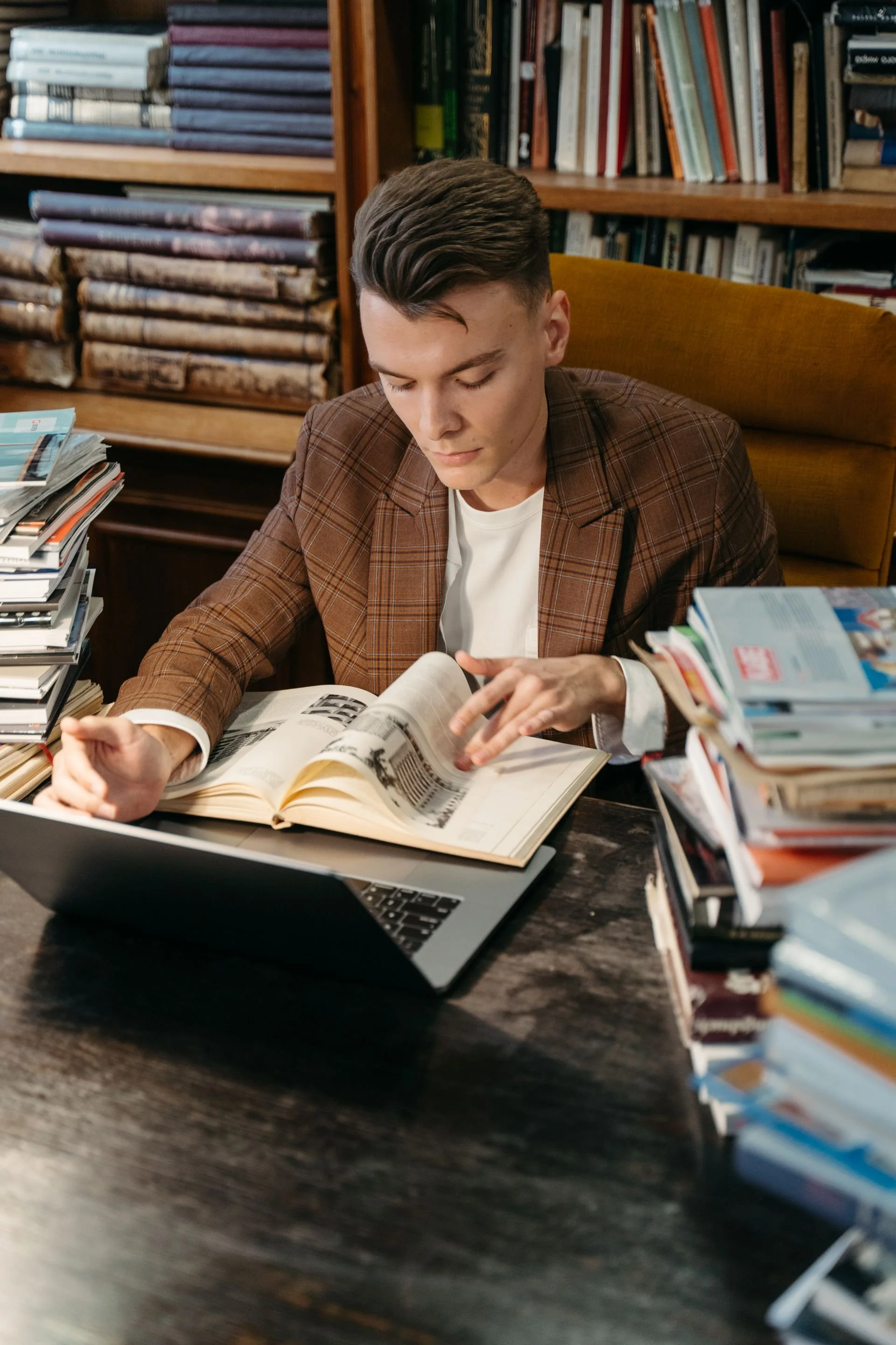 business leader reading books wellthera.jpg