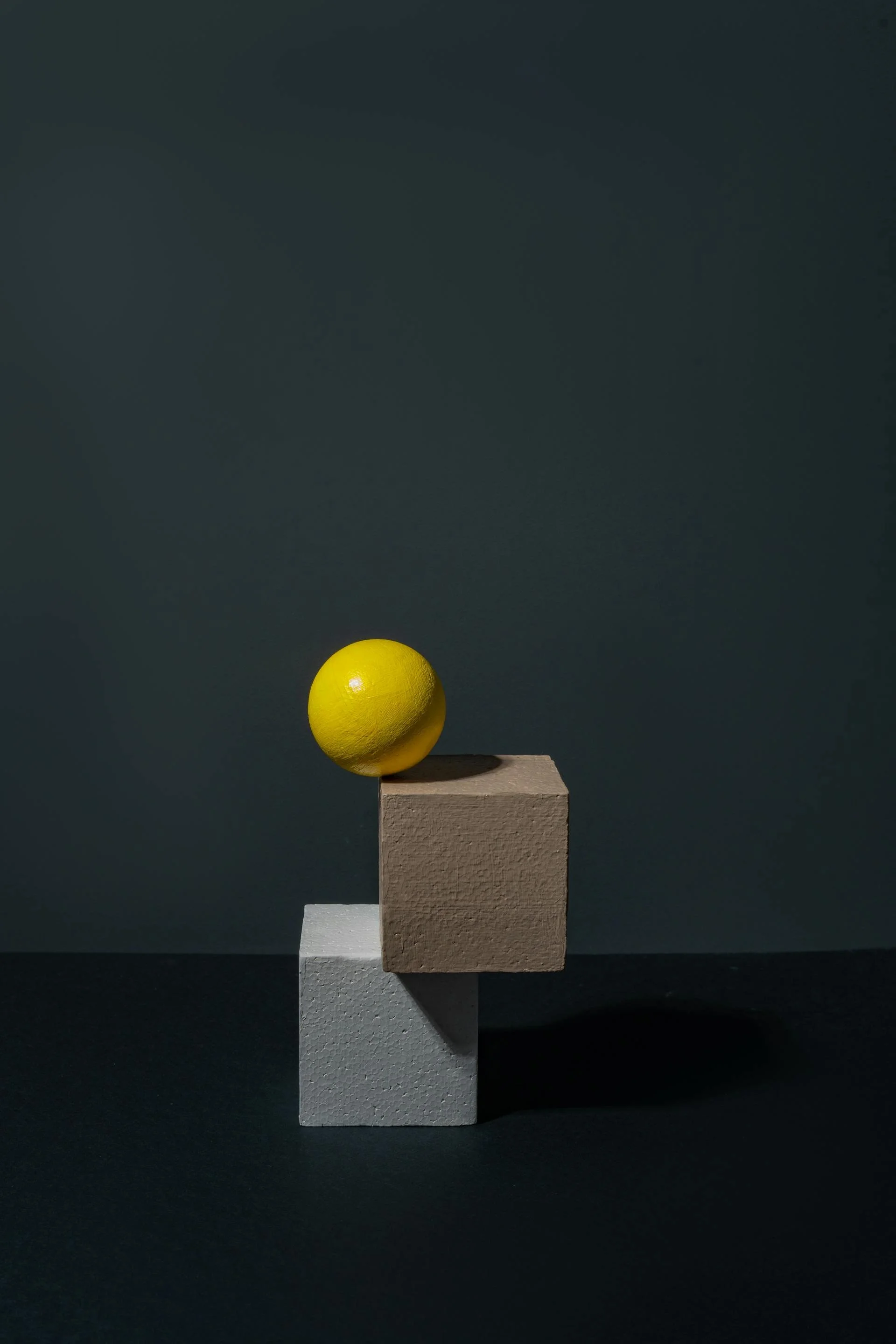 A 3D stock of 3 geometrical objects representing The WellThera Human Performance Hierchy. The base id PQ (Human Physical Intelligence) the middle is EQ (emotional intelligence) and the top IQ (Intellectual intelligence).