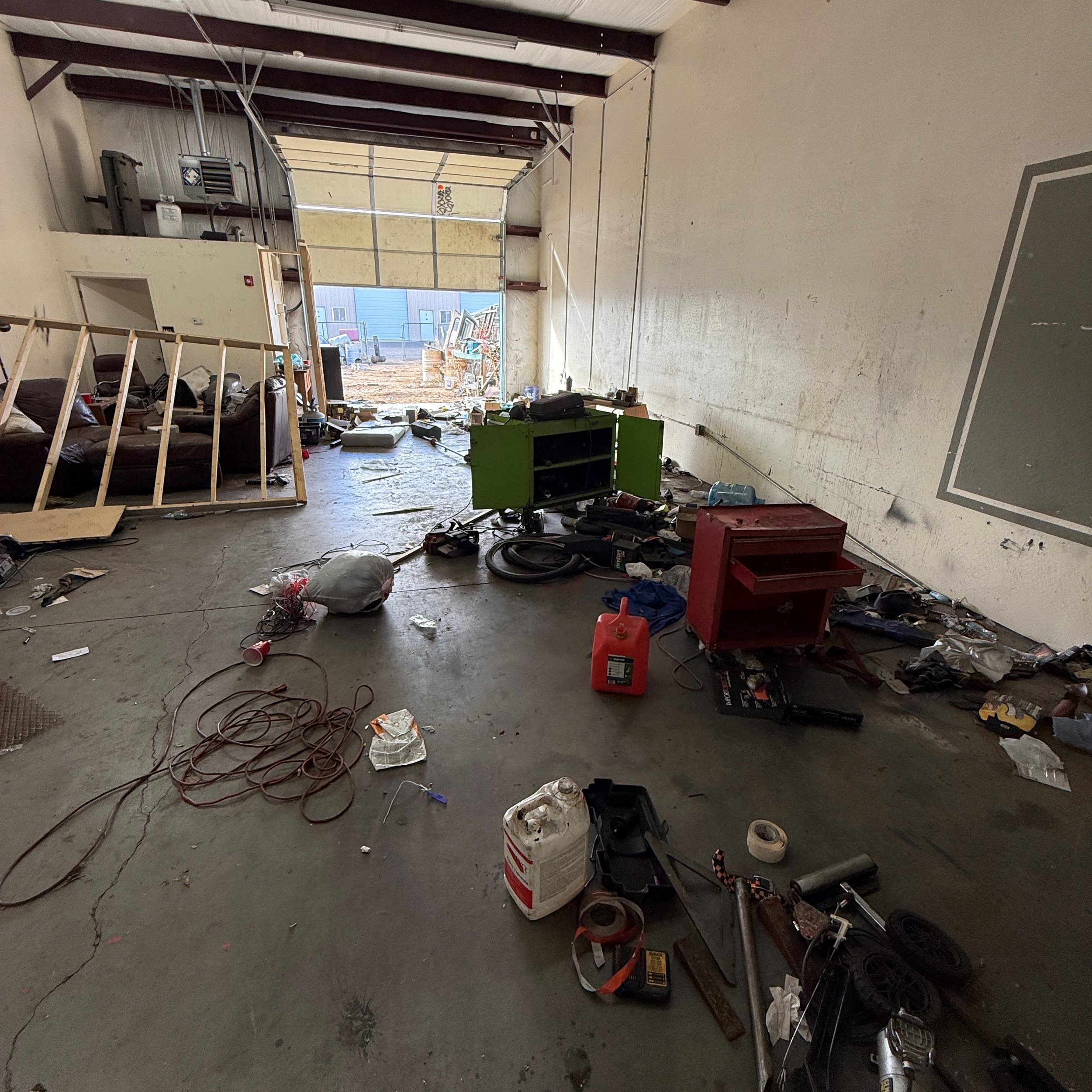 Chino Valley Commercial Warehouse Cleanout Before.JPG