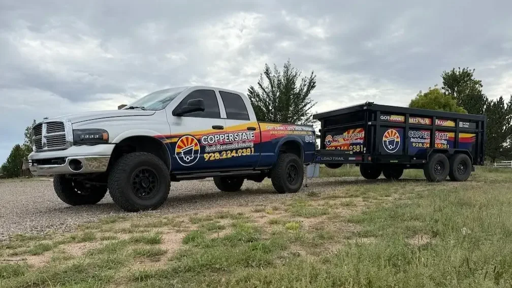 The worktruck and trailer for Copper State Junk Removal and Hauling