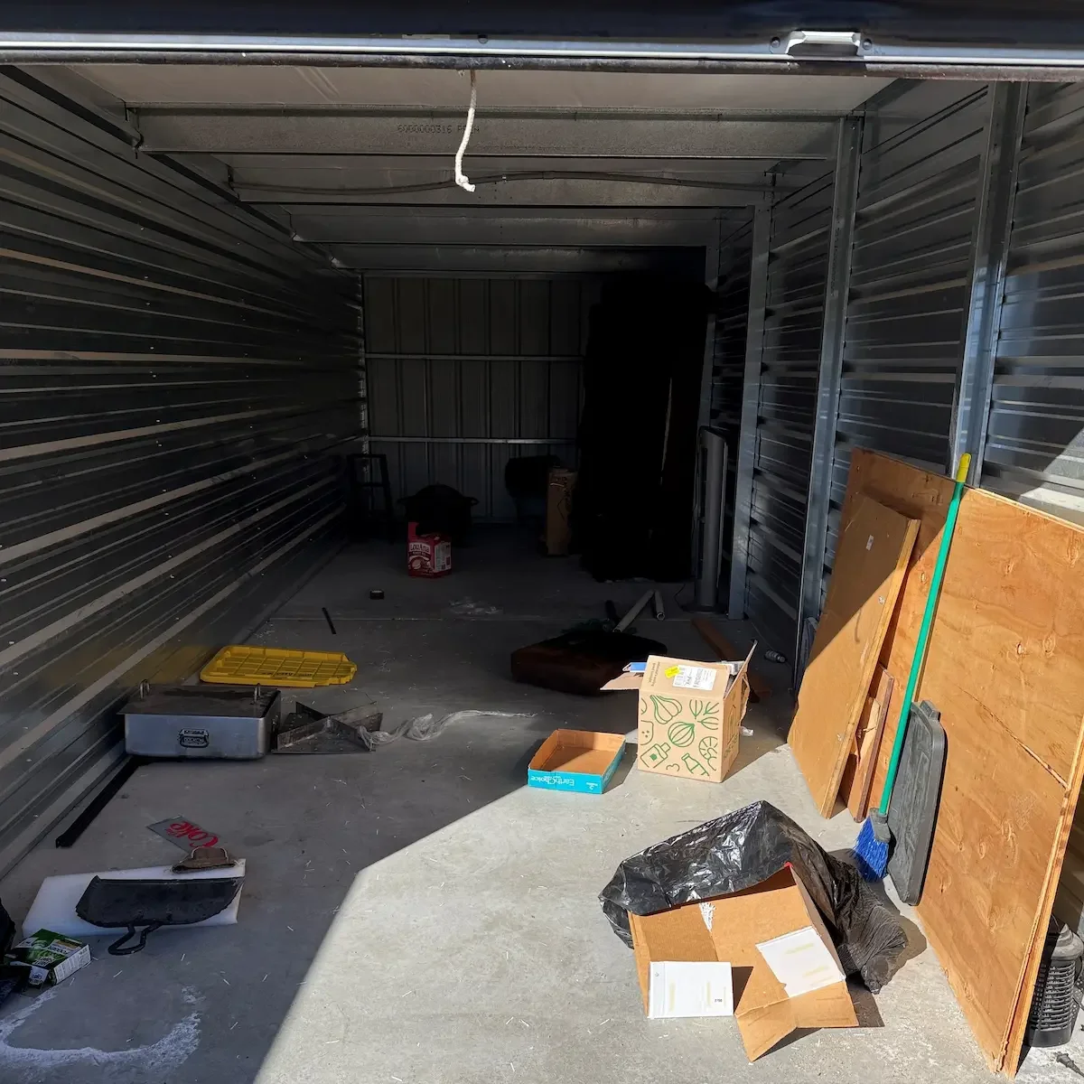 Copper State Junk Hauling clearing out a storage unit before