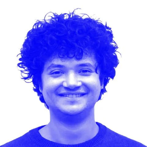 A blue-tinted photograph of Haitham Dahboor