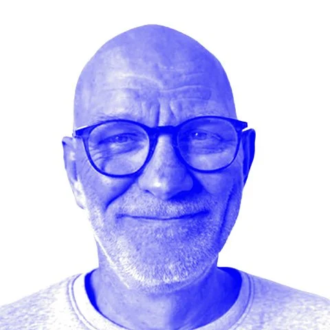 A blue-tinted photograph of Mads Bjerre Mouritzen