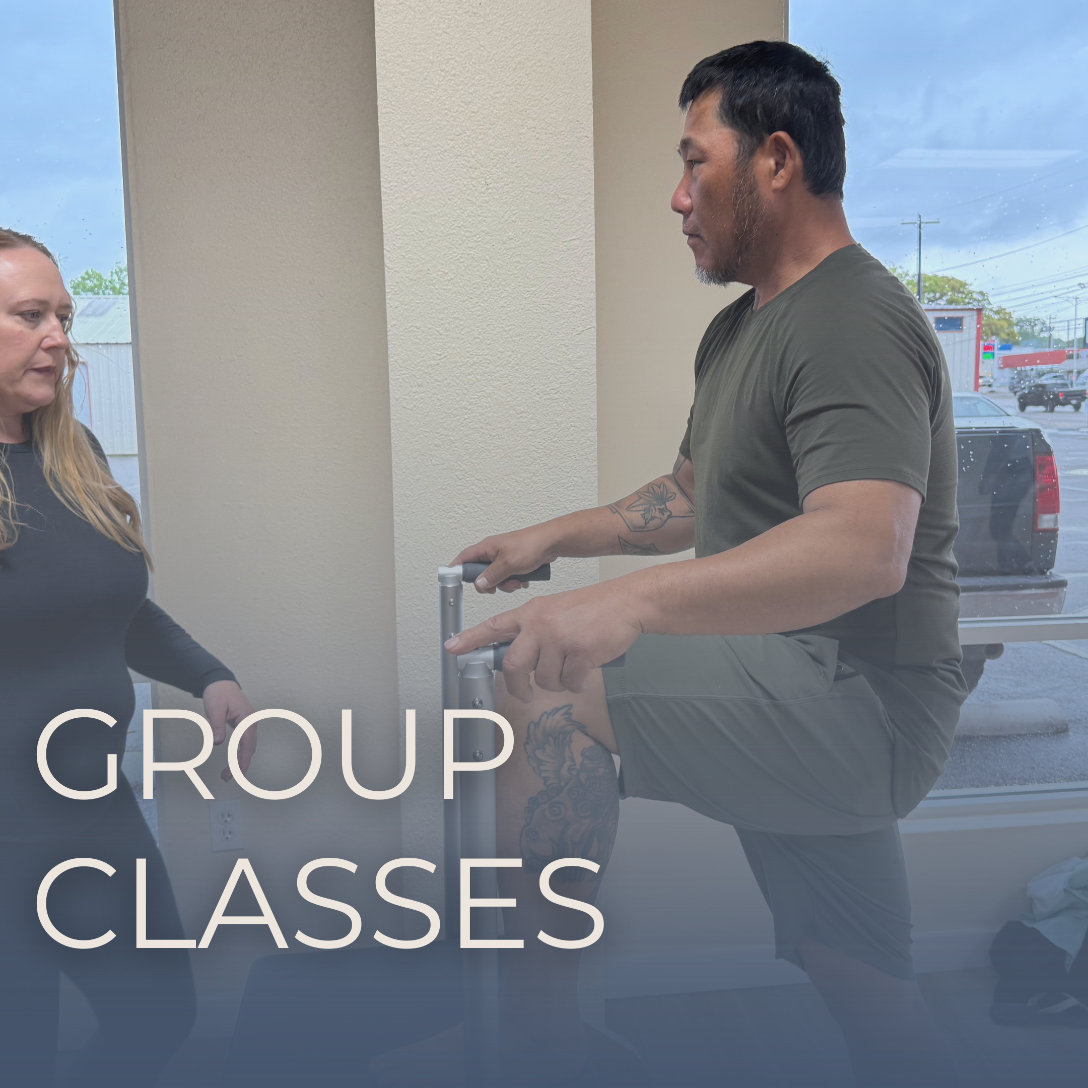 A man doing Pilates in a class.