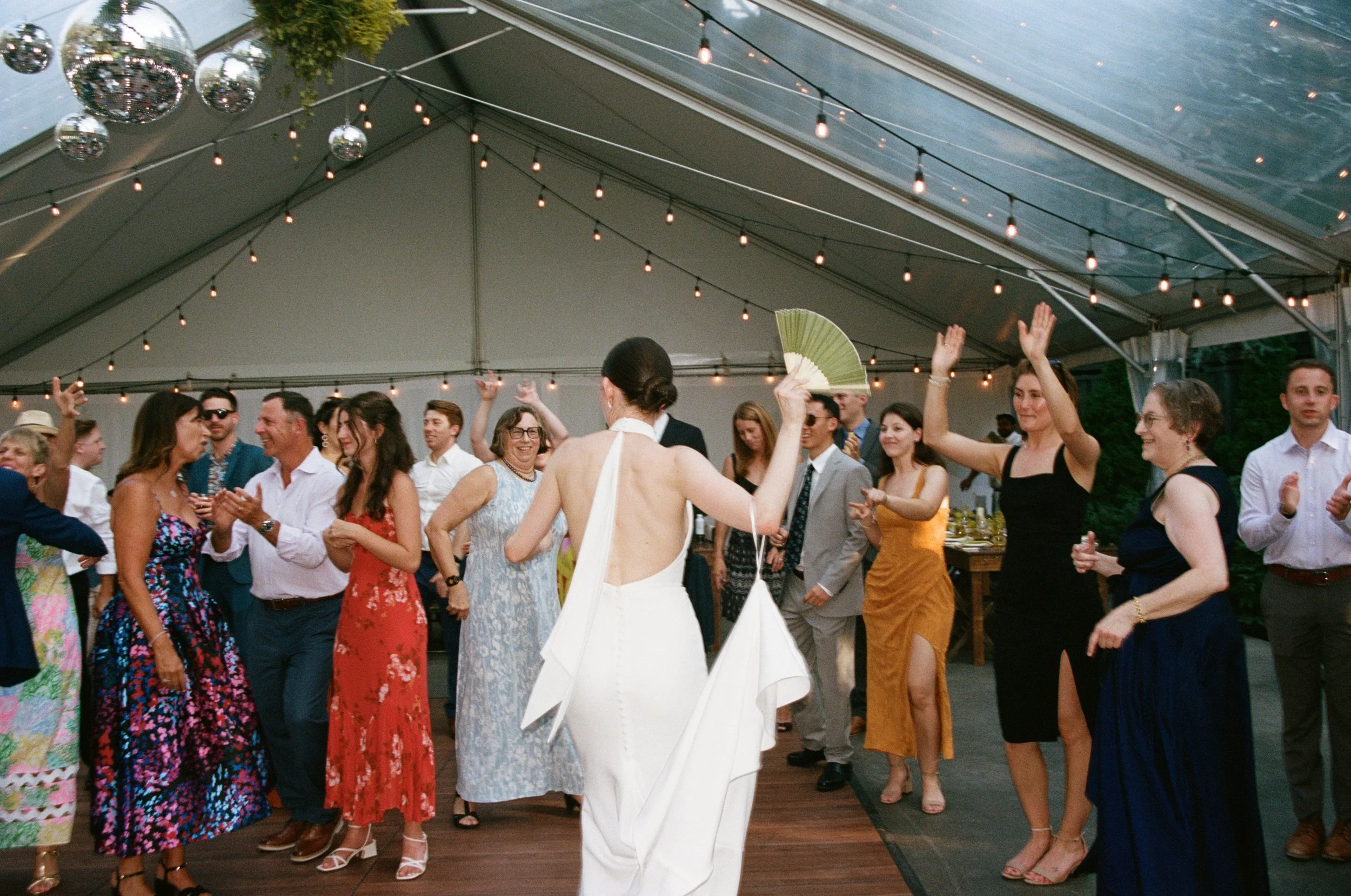 Bride walking onto the dance floor to join her guests at The Griffin House, Hood River Oregon