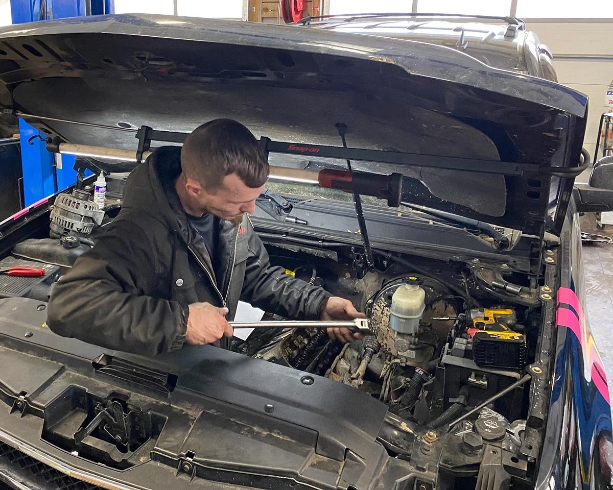 tac-employee-under-hood.jpg