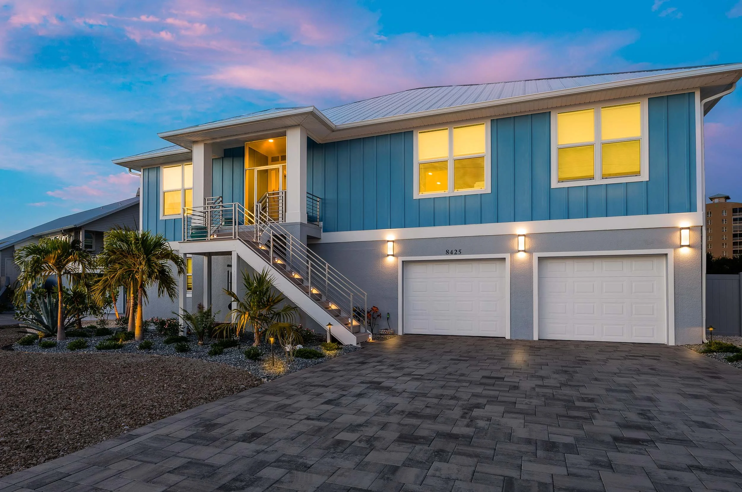Photo of gulf-access home on Estero Island at twilight.